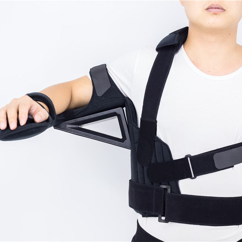 Verstellbare Armschlinge mit Schulterabduktionskissen und Taillenstützriemen